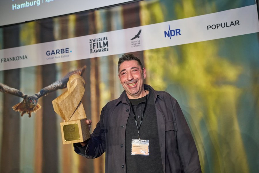 The proud creator and his owl for the ‘Wildlife’ category: Nathanaël Friloux